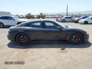 2022 Porsche Taycan GTS z VIN WP0AD2Y12NSA59275, wystawiony jako IAAI lot #42170547 z przebiegiem 43 757 mil mil oraz . Historia ofert i sprzedaży dostępna na DreamBid. Obrazek 13.