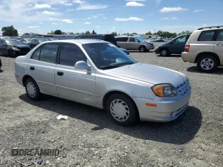 2005 Hyundai Accent GLS with VIN KMHCG45C65U576674, listed as a Copart auction lot 50726074 with 118,532 mi miles and Non Repairable. Bid and sale history available at carsss.com. Image 4.