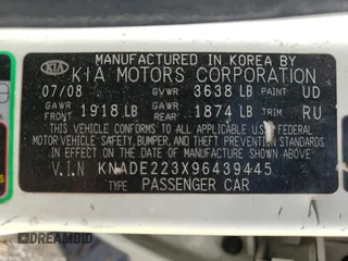 2009 Kia Rio LX with VIN KNADE223X96439445, listed as a Copart auction lot 54619335 with 102,120 mi miles and Salvage Title. Bid and sale history available at DreamBid. Image 12.