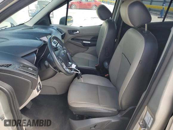 2015 Ford Transit Connect XLT with VIN NM0GS9F77F1185066, listed as a Copart auction lot 52049115 with 85,359 mi miles and Salvage title. Bid and sale history available at DreamBid. Image 7.