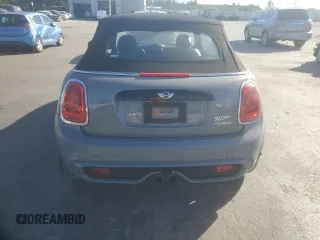 2017 MINI Convertible Cooper S z VIN WMWWG9C34H3C81536, wystawiony jako Copart lot #81806704 z przebiegiem 60 800 mil mil oraz Czysty tytuł • Clean title. Historia ofert i sprzedaży dostępna na DreamBid. Obrazek 6.