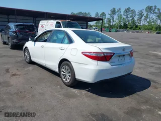 2015 Toyota Camry XLE with VIN 4T1BF1FK6FU948938, listed as a IAAI auction lot 42023487 with 107,232 mi miles. Bid and sale history available at carsss.com. Image 3.