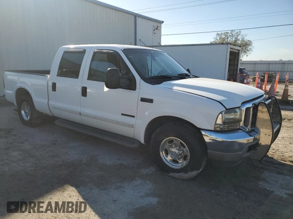2001 Ford Super Duty F-250 XL with VIN 1FTNW20F61EB42376, listed as a Copart auction lot 74001054 with 215,944 mi miles and Salvage Title. Bid and sale history available at carsss.com. Image 4.