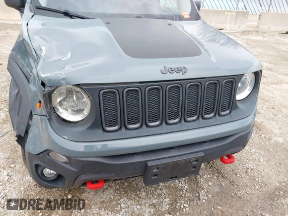 2015 Jeep Renegade Trailhawk z VIN ZACCJBCT4FPB79254, wystawiony jako IAAI lot #41965451 z przebiegiem 87 398 mil mil oraz . Historia ofert i sprzedaży dostępna na DreamBid. Obrazek 17.