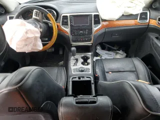 2013 Jeep Grand Cherokee Overland with VIN 1C4RJFCGXDC643802, listed as a Copart auction lot 52429535 with 122,014 mi miles and Salvage Title. Bid and sale history available at carsss.com. Image 8.
