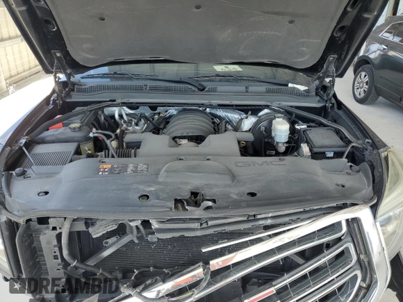 2016 GMC Yukon SLT with VIN 1GKS1BKC1GR363605, listed as a Copart auction lot 54324285 with 167,921 mi miles and Salvage Title. Bid and sale history available at carsss.com. Image 12.