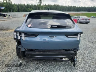 2023 Ford Mustang Mach-E Premium z VIN 3FMTK3R43PMA87670, wystawiony jako Copart lot #60697045 z przebiegiem 12 105 mil mil oraz Szkoda całkowita • Salvage title. Historia ofert i sprzedaży dostępna na DreamBid. Obrazek 6.