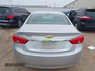 2014 Chevrolet Impala LT with VIN 2G1125S33E9101056, listed as a IAAI auction lot 41877161 with 130,757 mi miles and . Bid and sale history available at DreamBid. Image 17.