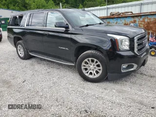 2019 GMC Yukon XL SLT with VIN 1GKS2GKC5KR166603, listed as a Copart auction lot 57913715 with 126,609 mi miles and Salvage title. Bid and sale history available at DreamBid. Image 4.