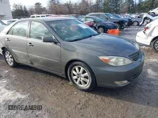 2003 Toyota Camry LE with VIN 4T1BE30K53U649007, listed as a IAAI auction lot 41030219 with 208,469 mi miles and . Bid and sale history available at DreamBid. Image 1.