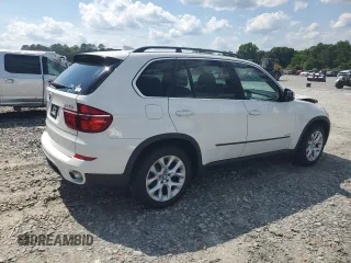 2013 BMW X5 xDrive35i z VIN 5UXZV4C52D0G56473, wystawiony jako Copart lot #56563345 z przebiegiem 156 884 mil mil oraz Szkoda całkowita • Salvage title. Historia ofert i sprzedaży dostępna na DreamBid. Obrazek 3.