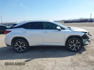 2016 Lexus RX 350 z VIN 2T2ZZMCA1GC017488, wystawiony jako IAAI lot #41568598 z przebiegiem 97 110 mil mil oraz . Historia ofert i sprzedaży dostępna na DreamBid. Obrazek 13.
