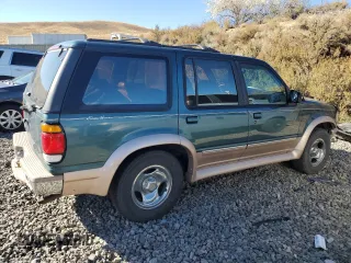 1996 Ford Explorer XL z VIN 1FMDU34X4TZA70403, wystawiony jako Copart lot #76780834 z przebiegiem 131 020 mil mil oraz Tytuł czysty. Historia ofert i sprzedaży dostępna na DreamBid. Obrazek 3.