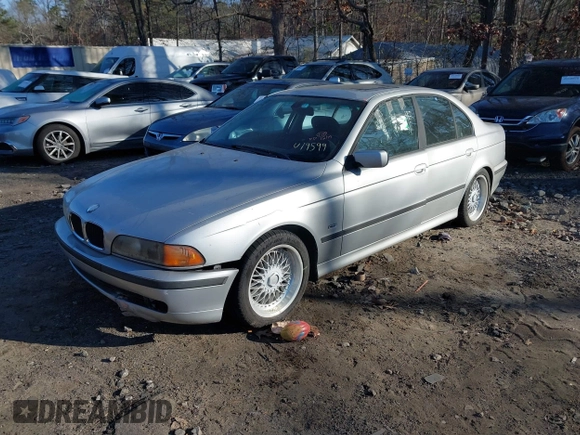 2000 BMW 5 Series 528iA with VIN WBADM6340YGU19599, listed as a IAAI auction lot 41139764 with 233,657 mi miles. Bid and sale history available at carsss.com. Image 2.
