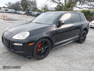 2009 Porsche Cayenne GTS with VIN WP1AD29P99LA62818, listed as a IAAI auction lot 41627073 with 166,414 mi miles. Bid and sale history available at carsss.com. Image 2.