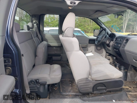 2005 Ford F-150 STX with VIN 1FTRX14W15FB47147, listed as a IAAI auction lot 42028662 with 174,354 mi miles. Bid and sale history available at carsss.com. Image 8.