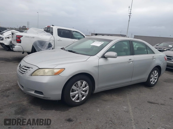 2007 Toyota Camry CE with VIN 4T1BE46K57U717034, listed as a IAAI auction lot 42192118 with 172,366 mi miles and . Bid and sale history available at DreamBid. Image 2.