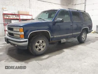 1999 Chevrolet Tahoe Z71 z VIN 1GNEK13R8XJ523049, wystawiony jako IAAI lot #41992101 z przebiegiem 180 169 mil mil oraz . Historia ofert i sprzedaży dostępna na DreamBid. Obrazek 2.