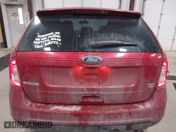 2011 Ford Edge SEL with VIN 2FMDK4JC4BBA38257, listed as a IAAI auction lot 41216860 with 148,351 mi miles. Bid and sale history available at carsss.com. Image 16.