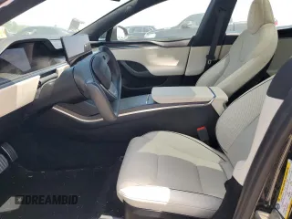 2023 Tesla Model S Plaid with VIN 5YJSA1E62PF511875, listed as a Copart auction lot 65583824 with Not provided miles and Salvage title. Bid and sale history available at DreamBid. Image 7.