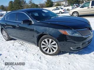 2014 Lincoln MKS with VIN 1LNHL9DK8EG600981, listed as a IAAI auction lot 41359187 with 158,589 mi miles. Bid and sale history available at carsss.com. Image 1.