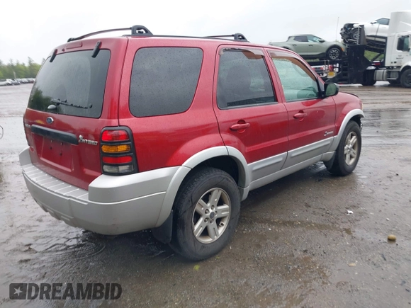 2005 Ford Escape Hybrid with VIN 1FMCU96H95KC81872, listed as a IAAI auction lot 42292225 with 165,259 mi miles and . Bid and sale history available at DreamBid. Image 4.