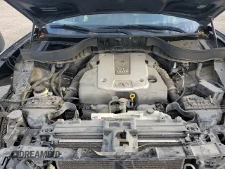 2015 Infiniti QX70 z VIN JN8CS1MUXFM381307, wystawiony jako Copart lot #47267545 z przebiegiem 171 240 mil mil oraz Szkoda całkowita • Salvage title. Historia ofert i sprzedaży dostępna na DreamBid. Obrazek 11.