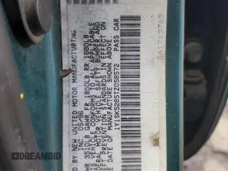 1996 Chevrolet Prizm z VIN 1Y1SK5285TZ058572, wystawiony jako Copart lot #51303845 z przebiegiem 87 109 mil mil oraz Szkoda całkowita • Salvage title. Historia ofert i sprzedaży dostępna na DreamBid. Obrazek 12.