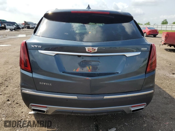 2021 Cadillac XT5 FWD Premium Luxury with VIN 1GYKNCRSXMZ118083, listed as a Copart auction lot 54703225 with 45,973 mi miles and Salvage Title. Bid and sale history available at carsss.com. Image 6.