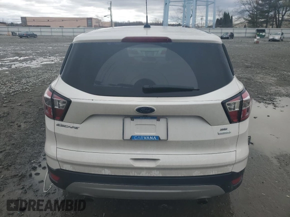2017 Ford Escape SE with VIN 1FMCU0GD6HUC64348, listed as a Copart auction lot 49464525 with 82,273 mi miles and Salvage Title. Bid and sale history available at DreamBid. Image 6.