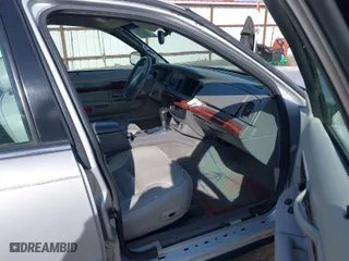 2002 Mercury Grand Marquis LS Premium with VIN 2MEFM75W62X660857, listed as a IAAI auction lot 42009128 with 80,957 mi miles. Bid and sale history available at carsss.com. Image 5.