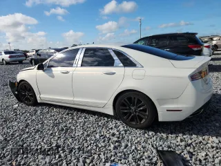 2013 Lincoln MKZ z VIN 3LN6L2GK1DR816558, wystawiony jako Copart lot #60424415 z przebiegiem 95 593 mil mil oraz Szkoda całkowita • Salvage title. Historia ofert i sprzedaży dostępna na DreamBid. Obrazek 2.