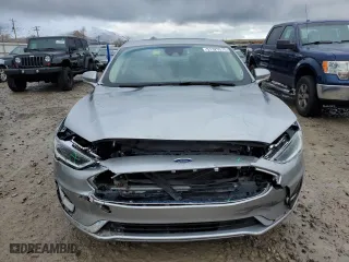 2020 Ford Fusion Hybrid Titanium with VIN 3FA6P0RU5LR100360, listed as a Copart auction lot 51325575 with 77,217 mi miles and Salvage Title. Bid and sale history available at carsss.com. Image 5.