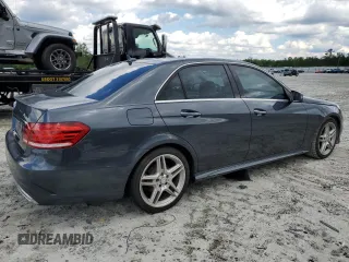 2014 Mercedes-Benz E 350 Sport with VIN WDDHF5KB9EA825975, listed as a Copart auction lot 55427505 with 134,668 mi miles and Salvage title. Bid and sale history available at DreamBid. Image 3.