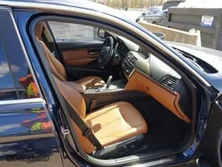 2013 BMW 3 Series 328i xDrive with VIN WBA3B3C54DF532965, listed as a IAAI auction lot 41955104 with 150,455 mi miles. Bid and sale history available at carsss.com. Image 5.