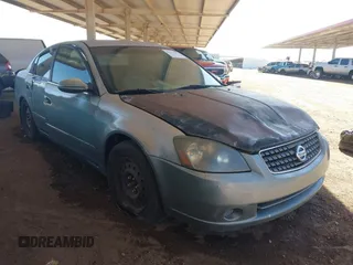 2006 Nissan Altima S z VIN 1N4AL11E46C113409, wystawiony jako IAAI lot #42271376 z przebiegiem 256 219 mil mil oraz . Historia ofert i sprzedaży dostępna na DreamBid. Obrazek 1.