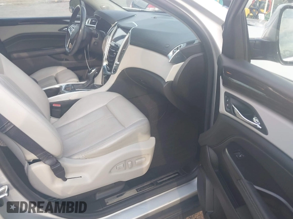 2015 Cadillac SRX Luxury Collection with VIN 3GYFNBE3XFS612048, listed as a IAAI auction lot 41923525 with 154,621 mi miles. Bid and sale history available at carsss.com. Image 5.