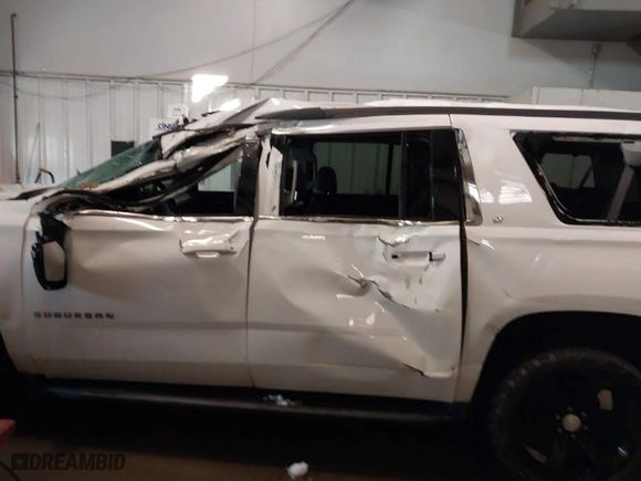 2017 Chevrolet Suburban LT with VIN 1GNSKHKCXHR328405, listed as a IAAI auction lot 41353035 with NaN miles. Bid and sale history available at carsss.com. Image 6.