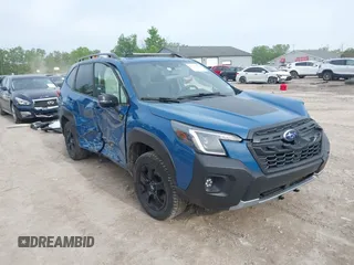 2022 Subaru Forester Wilderness with VIN JF2SKAMC3NH423002, listed as a IAAI auction lot 42351129 with 47,222 mi miles and . Bid and sale history available at DreamBid. Image 1.