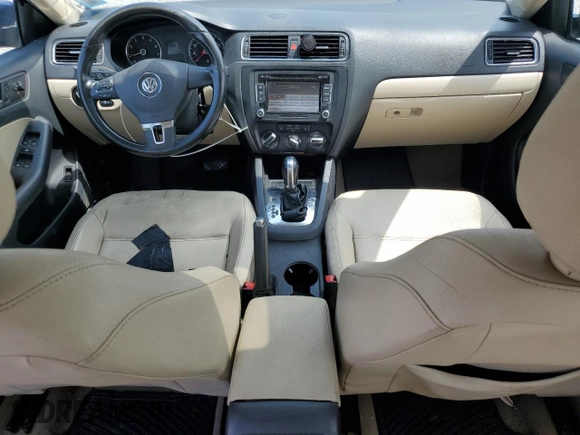 2012 Volkswagen Jetta SE with VIN 3VWDP7AJXCM392741, listed as a Copart auction lot 61436215 with 169,452 mi miles and Salvage title. Bid and sale history available at DreamBid. Image 8.