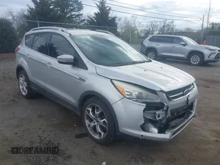 2013 Ford Escape Titanium z VIN 1FMCU0J96DUA19547, wystawiony jako IAAI lot #41924324 z przebiegiem 135 367 mil mil oraz . Historia ofert i sprzedaży dostępna na DreamBid. Obrazek 1.