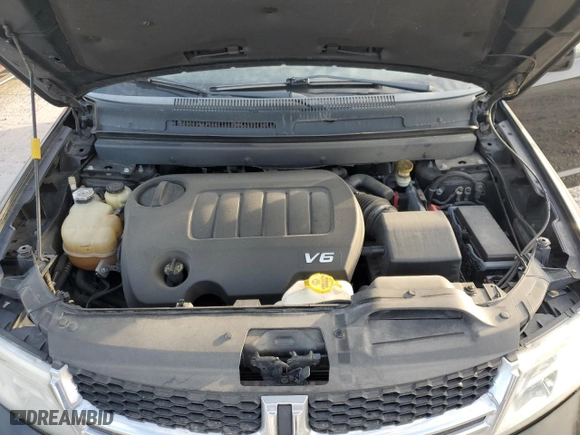 2017 Dodge Journey SXT with VIN 3C4PDCBG1HT510712, listed as a Copart auction lot 77676784 with 130,448 mi miles and Salvage Title. Bid and sale history available at carsss.com. Image 12.