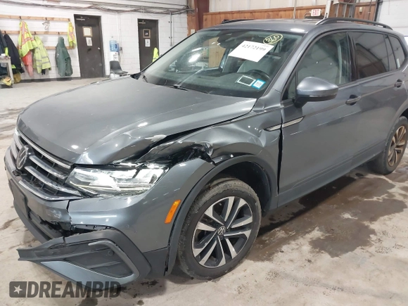 2022 Volkswagen Tiguan S z VIN 3VV0B7AX2NM042934, wystawiony jako IAAI lot #42172199 z przebiegiem 71 367 mil mil oraz . Historia ofert i sprzedaży dostępna na DreamBid. Obrazek 6.