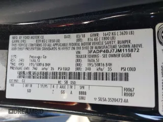 2018 Ford Fiesta SE with VIN 3FADP4BJ7JM115872, listed as a IAAI auction lot 41969970 with 156,537 mi miles. Bid and sale history available at carsss.com. Image 9.