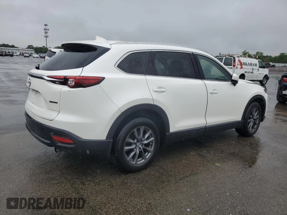 2021 Mazda CX-9 Touring z VIN JM3TCBCY1M0536616, wystawiony jako Copart lot #60242445 z przebiegiem 40 057 mil mil oraz Szkoda całkowita • Salvage title. Historia ofert i sprzedaży dostępna na DreamBid. Obrazek 3.