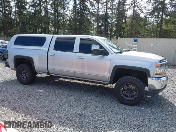 2017 Chevrolet Silverado 1500 LT with VIN 3GCUKREC7HG233366, listed as a IAAI auction lot 42254699 with 105,655 mi miles and . Bid and sale history available at DreamBid. Image 14.