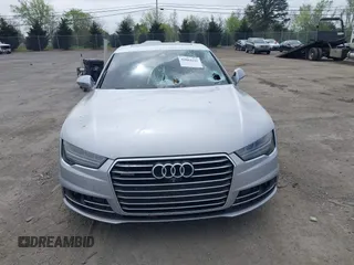 2016 Audi A7 Prestige z VIN WAU2GAFC6GN007637, wystawiony jako IAAI lot #42084141 z przebiegiem 131 213 mil mil oraz . Historia ofert i sprzedaży dostępna na DreamBid. Obrazek 12.