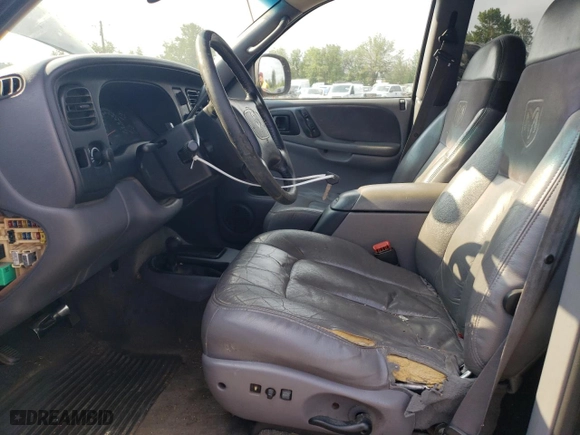 1998 Dodge Durango with VIN 1B4HS28Z2WF202756, listed as a Copart auction lot 66585024 with 263,722 mi miles and Salvage Title. Bid and sale history available at carsss.com. Image 7.