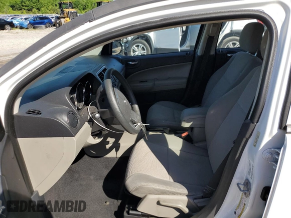 2011 Dodge Caliber Mainstreet with VIN 1B3CB3HA2BD231632, listed as a Copart auction lot 55273855 with 70,818 mi miles and Salvage Title. Bid and sale history available at DreamBid. Image 7.