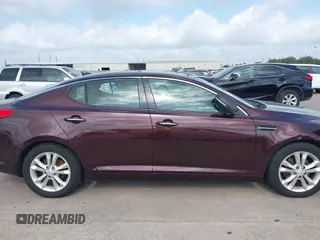 2013 Kia Optima EX with VIN 5XXGN4A74DG148692, listed as a IAAI auction lot 42184122 with 231,133 mi miles and . Bid and sale history available at DreamBid. Image 14.